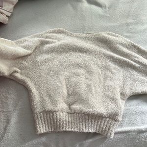 cream sweater